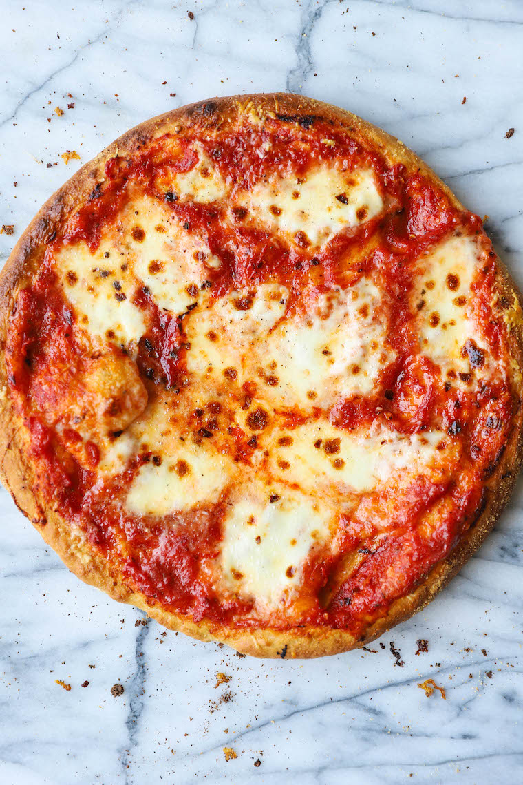 Homemade Pizza Dough - So much easier to make than you think, and it's such a game-changer! Perfect for pizza night and it's freezer-friendly!