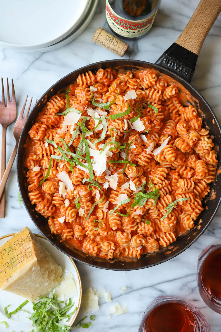 Vodka Sauce - Amazingly creamy, so bright, and super quick + easy. Comes together in 30 min! Serve with additional fresh Parmesan. SO SO GOOD.