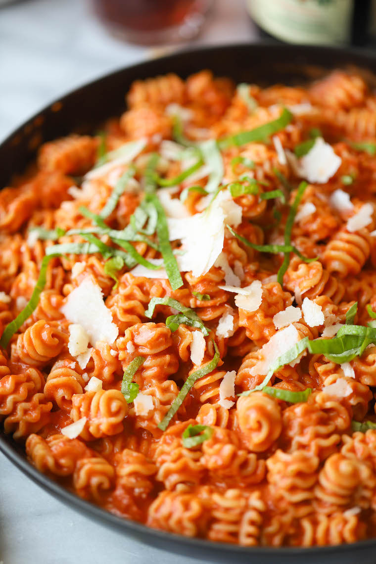 Vodka Sauce - Amazingly creamy, so bright, and super quick + easy. Comes together in 30 min! Serve with additional fresh Parmesan. SO SO GOOD.