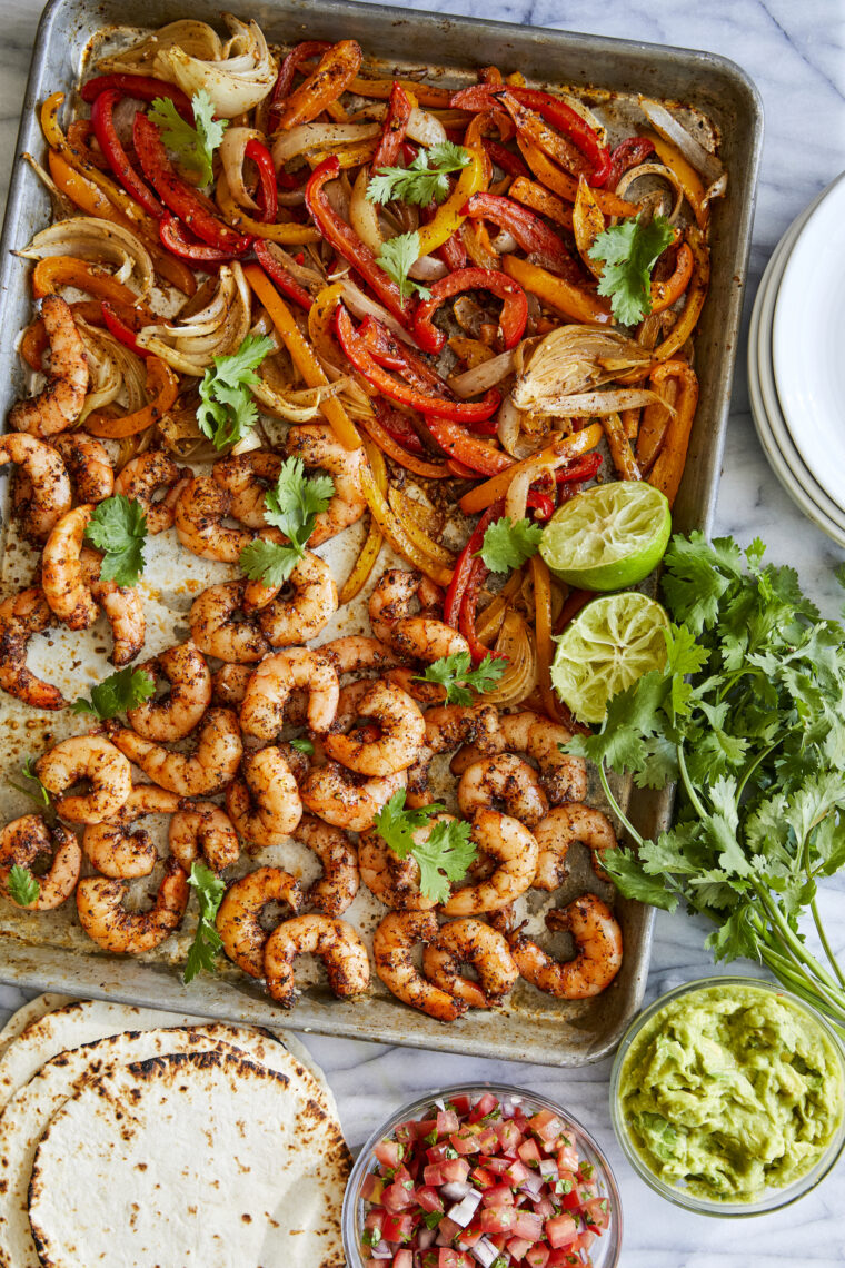 Sheet Pan Shrimp Fajitas - The quickest (easiest) sheet pan dinner! Serve with warm tortillas for a lightening fast weeknight meal. SO GOOD!