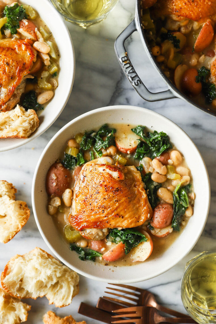 Chicken and White Bean Stew - Chockfull of chicken, white beans, potatoes and kale! Serve with a salad and crusty bread. SO GOOD, so cozy.