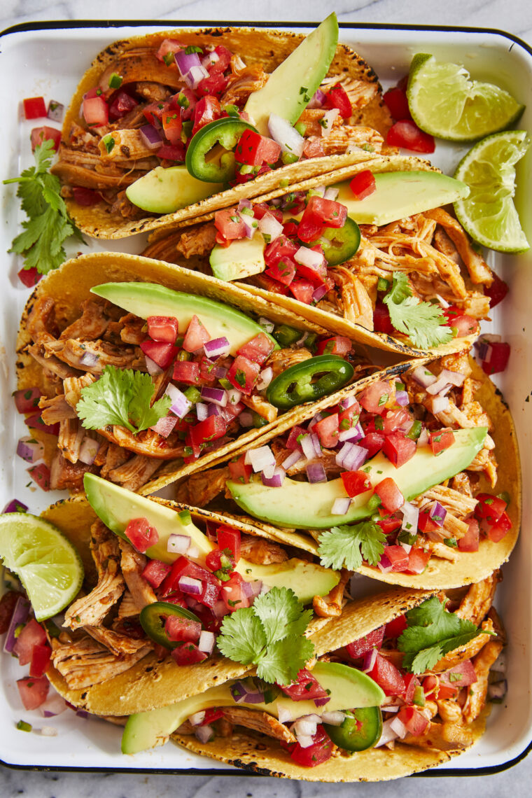 Instant Pot Chicken Tacos - Taco night just got even better (and quicker!) with the juiciest, most flavorful shredded salsa chicken!