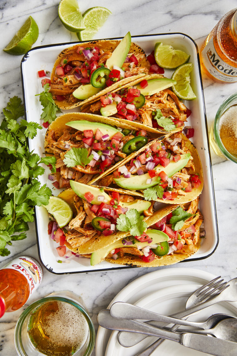 Instant Pot Chicken Tacos - Taco night just got even better (and quicker!) with the juiciest, most flavorful shredded salsa chicken!