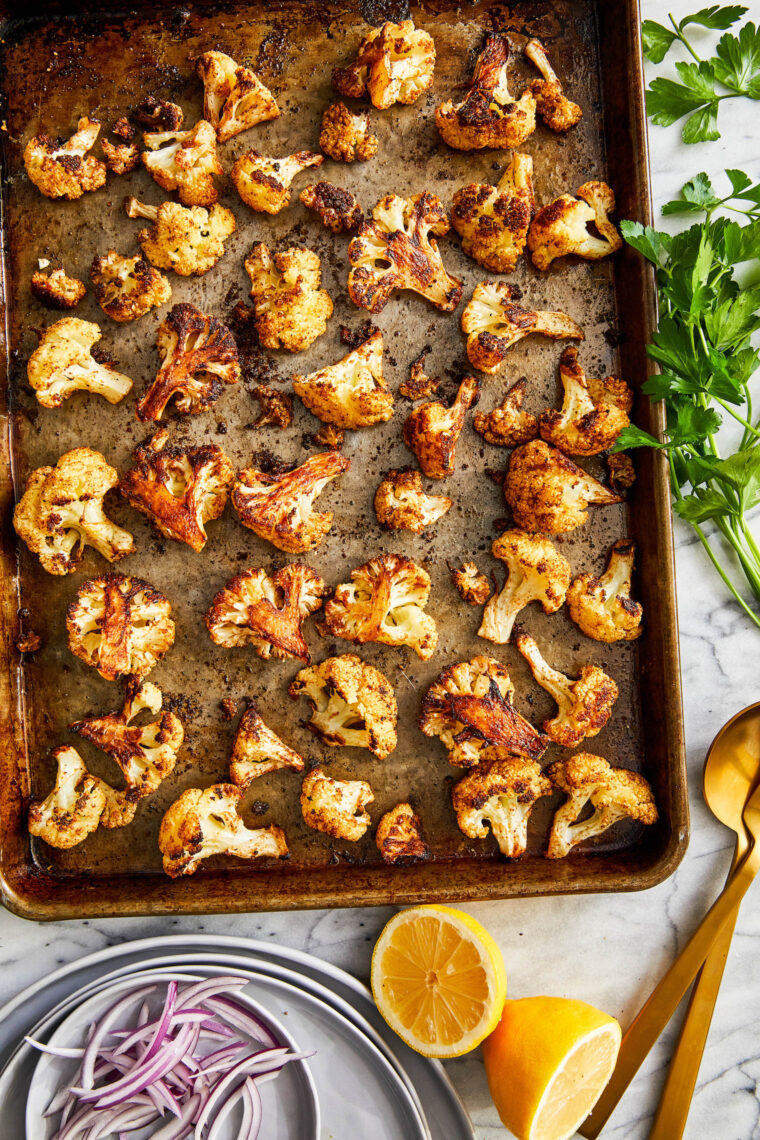 Roasted Cauliflower - The BEST seasoned roasted cauliflower! Amazingly crisp-tender, golden-brown and the most perfect side dish to any meal!