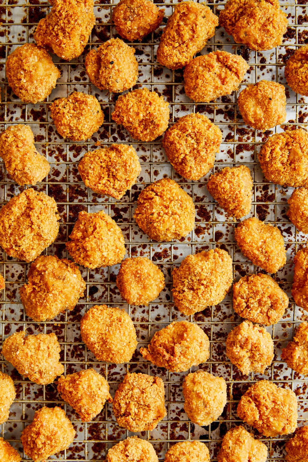 I'm still all in, though. And the fact that these are fully baked is even better. The trick? Using cornflake crumbs, bake these bad guys on a cooling rack, allowing them to crisp up all over.