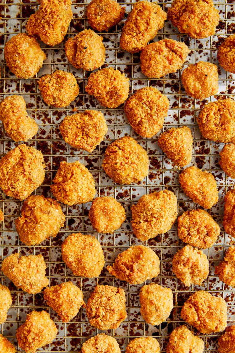 Baked Chicken Nuggets - The BEST crisp-tender chicken nuggets that are completely oven baked! Serve with ketchup, honey mustard or Ranch!