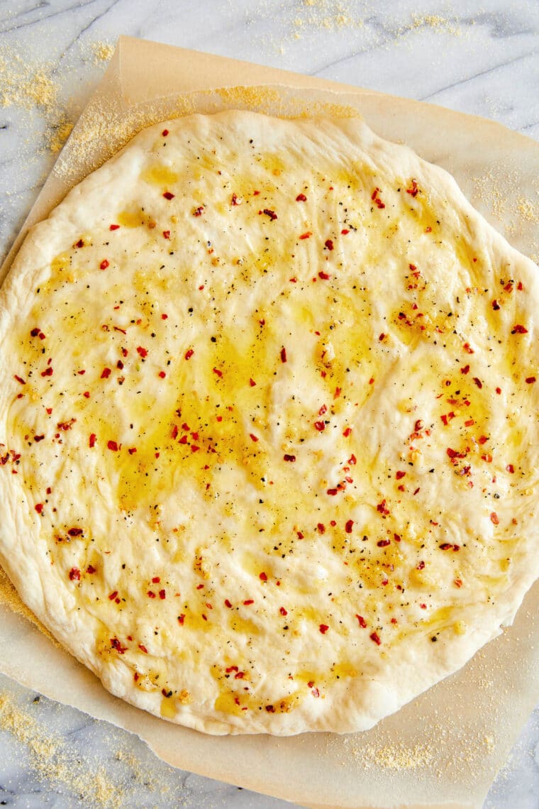 White Pizza - Made with 3 different cheeses (no tomato sauce here!) and drizzled with extra-virgin olive oil, garlicky goodness. Yes, please!