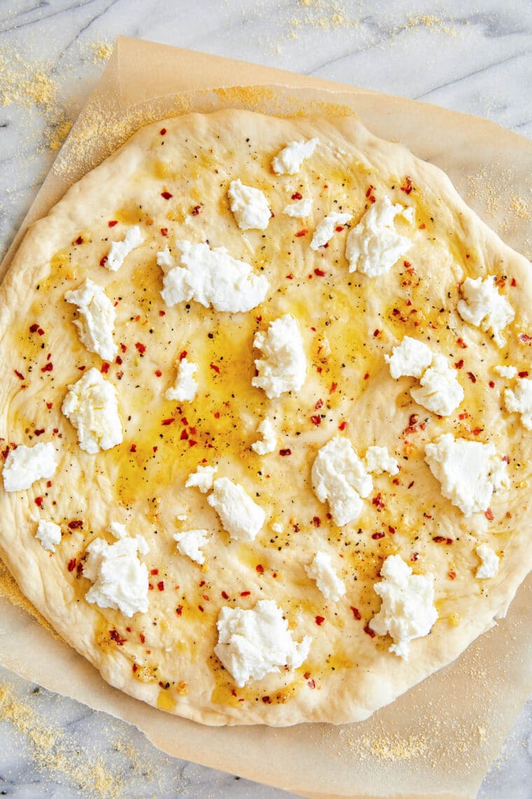 White Pizza - Made with 3 different cheeses (no tomato sauce here!) and drizzled with extra-virgin olive oil, garlicky goodness. Yes, please!