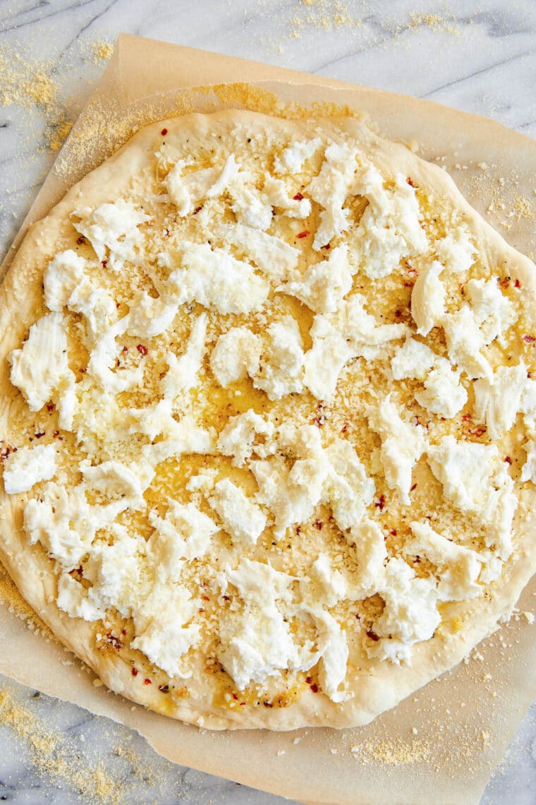 White Pizza - Made with 3 different cheeses (no tomato sauce here!) and drizzled with extra-virgin olive oil, garlicky goodness. Yes, please!