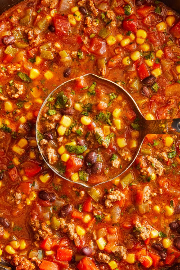 Easy Taco Soup - THE BEST taco soup ever! So hearty, so cozy and incredibly budget-friendly. Makes a big batch too - perfect for freezing!