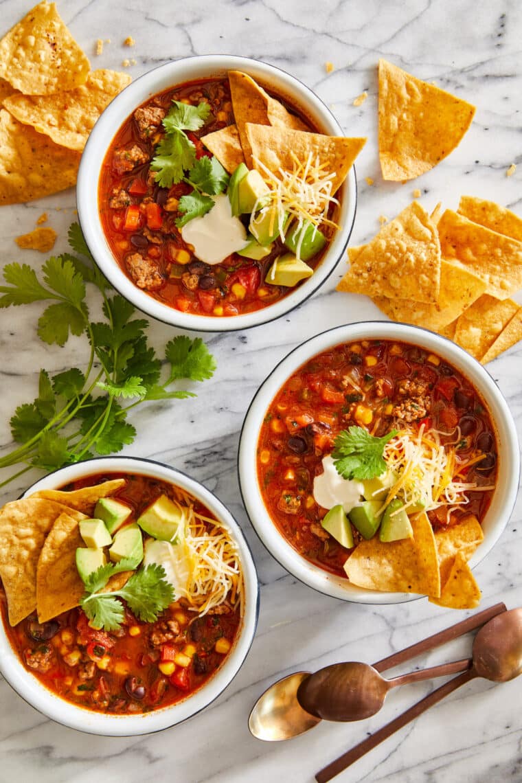 Easy Taco Soup - THE BEST taco soup ever! So hearty, so cozy and incredibly budget-friendly. Makes a big batch too - perfect for freezing!
