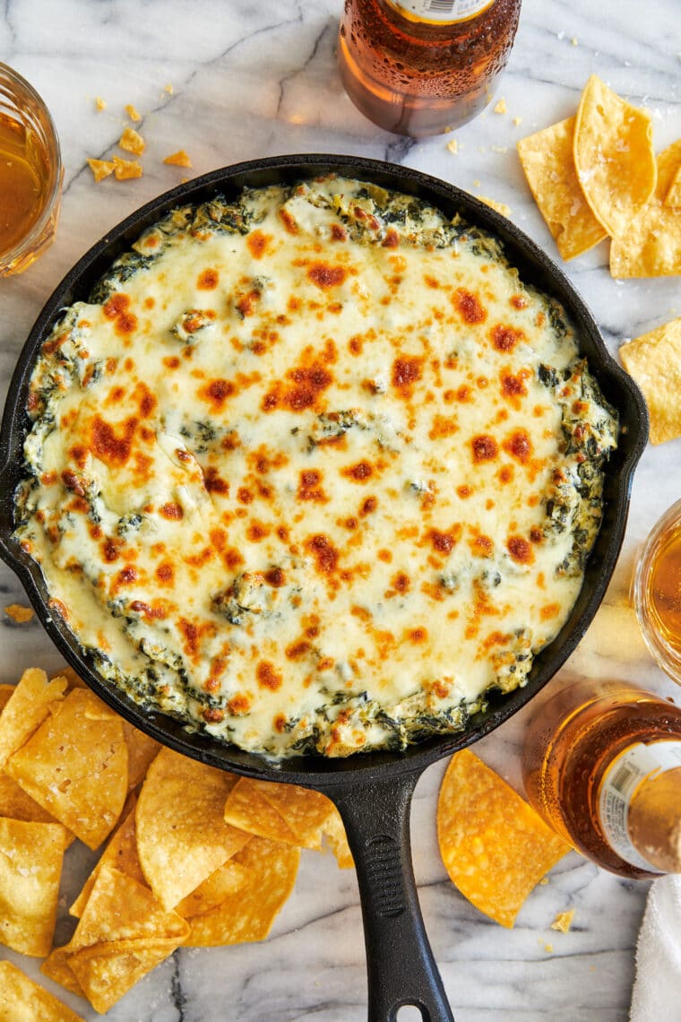 Hot Spinach and Artichoke Dip - The BEST spinach and artichoke dip! So cheesy, so rich, so creamy, so stinking easy. Sure to please everyone!
