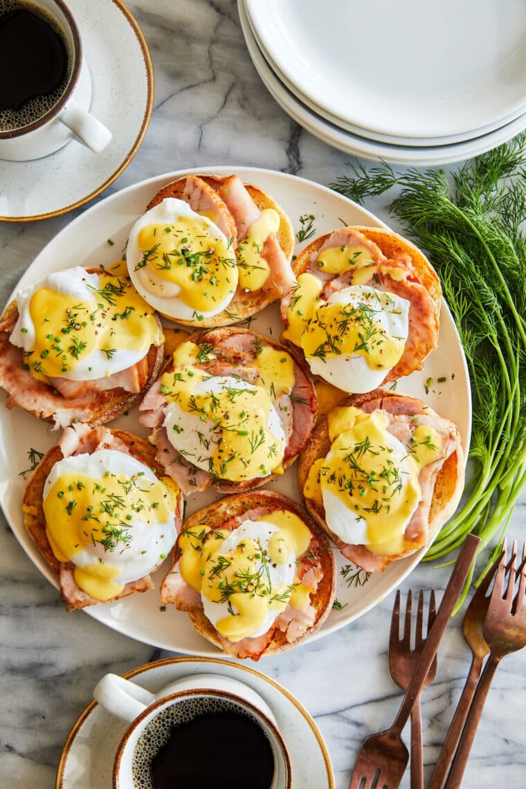 Classic Eggs Benedict - Truly the BEST eggs benedict recipe you can make right at home! Made with the creamiest benedict (hollandaise) sauce.