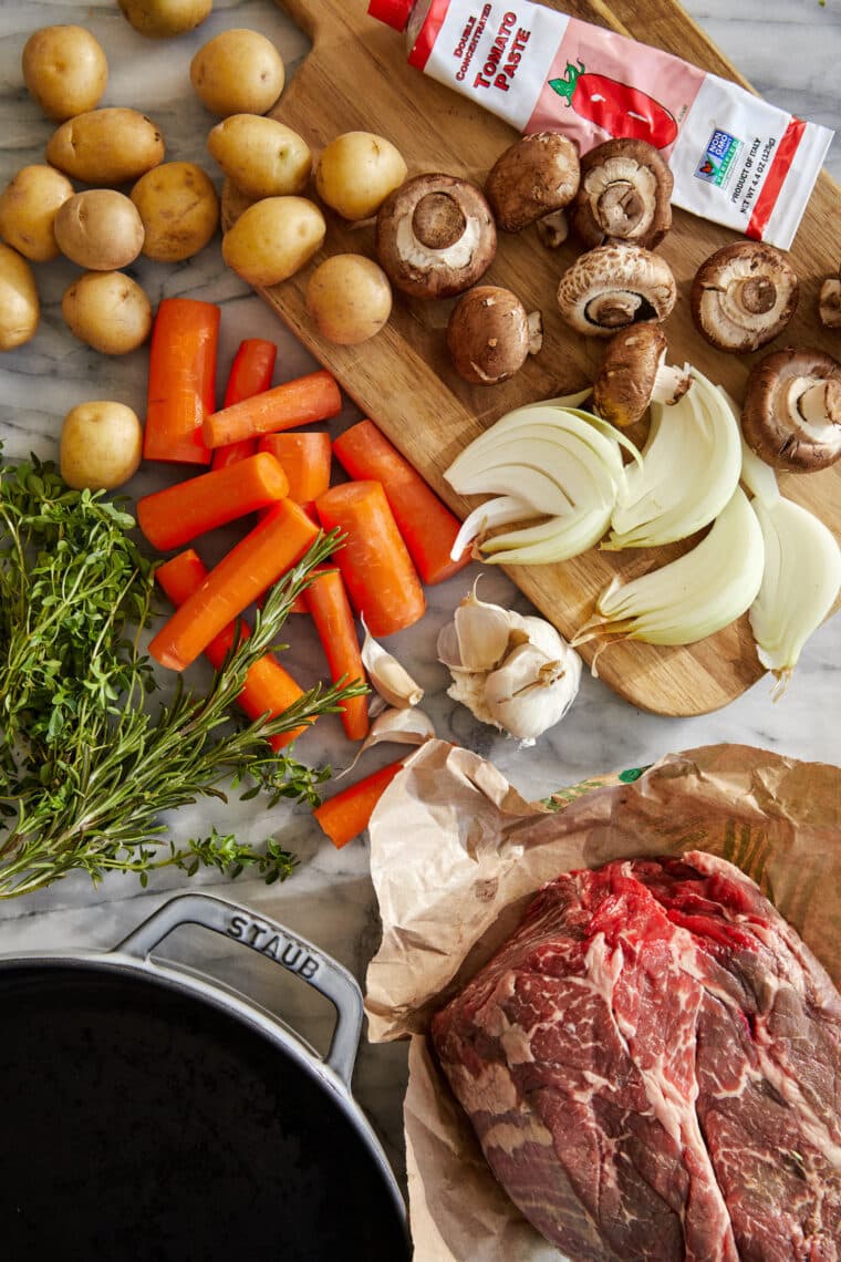 Perfect Pot Roast - Truly the best melt-in-your-mouth pot roast, cooked low and slow and simmered until perfection. Serve with crusty bread!