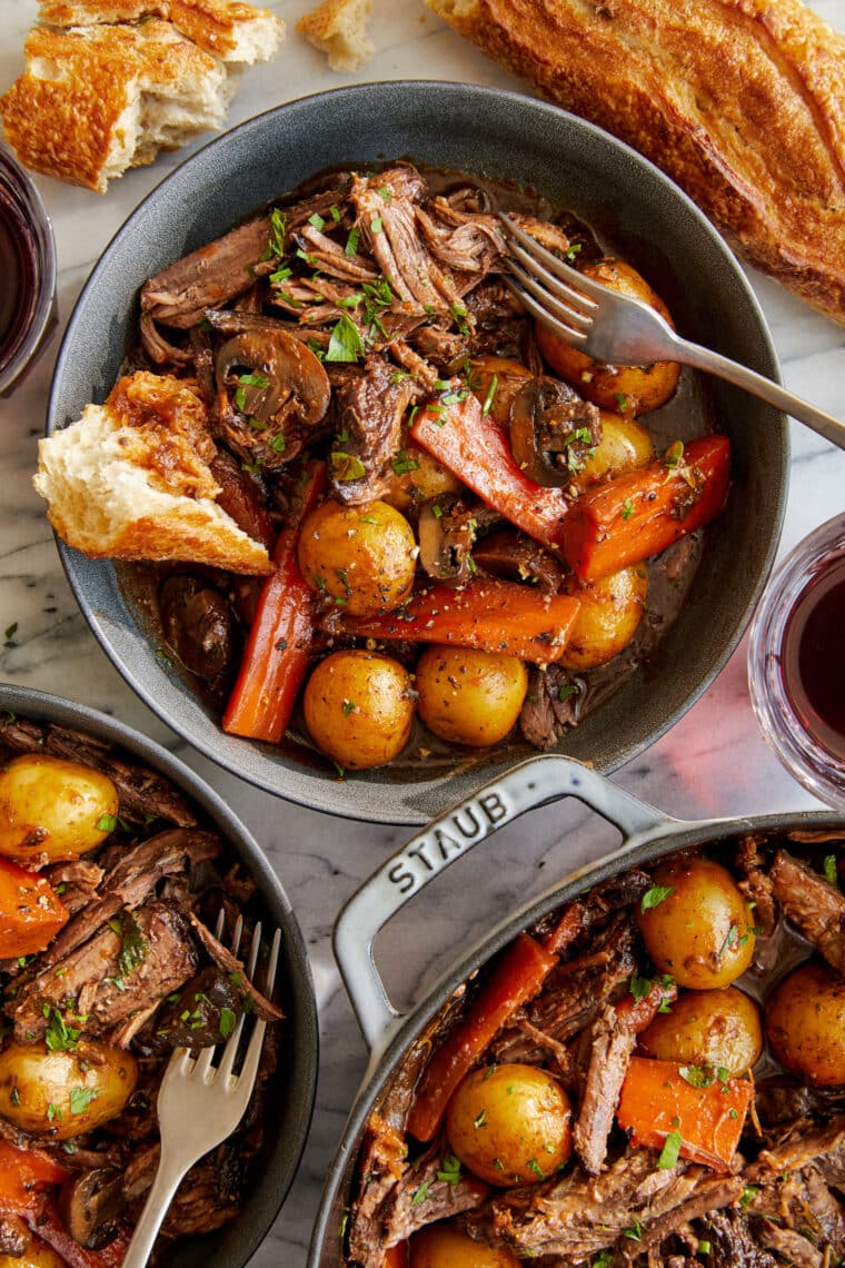 Perfect Pot Roast - Truly the best melt-in-your-mouth pot roast, cooked low and slow and simmered until perfection. Serve with crusty bread!