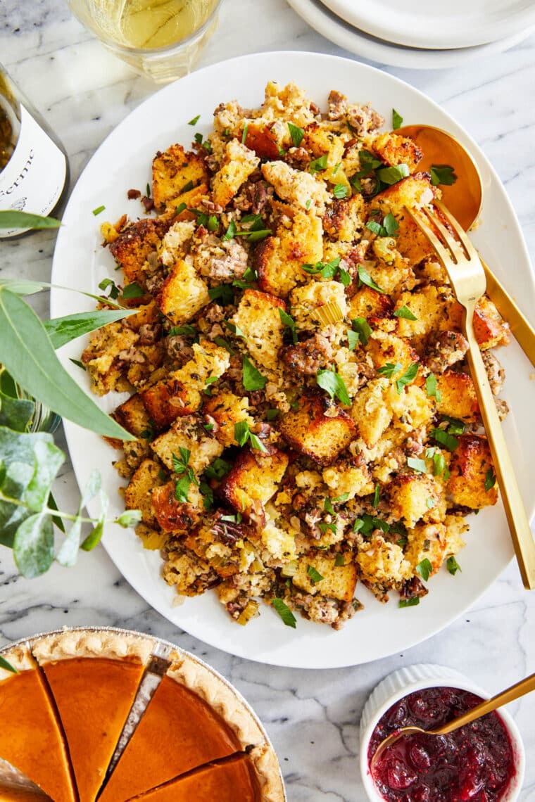 Cornbread Stuffing - Made with homemade cornbread, crumbled sausage, fresh sage and thyme. So crumbly and so good. Truly a family-favorite!