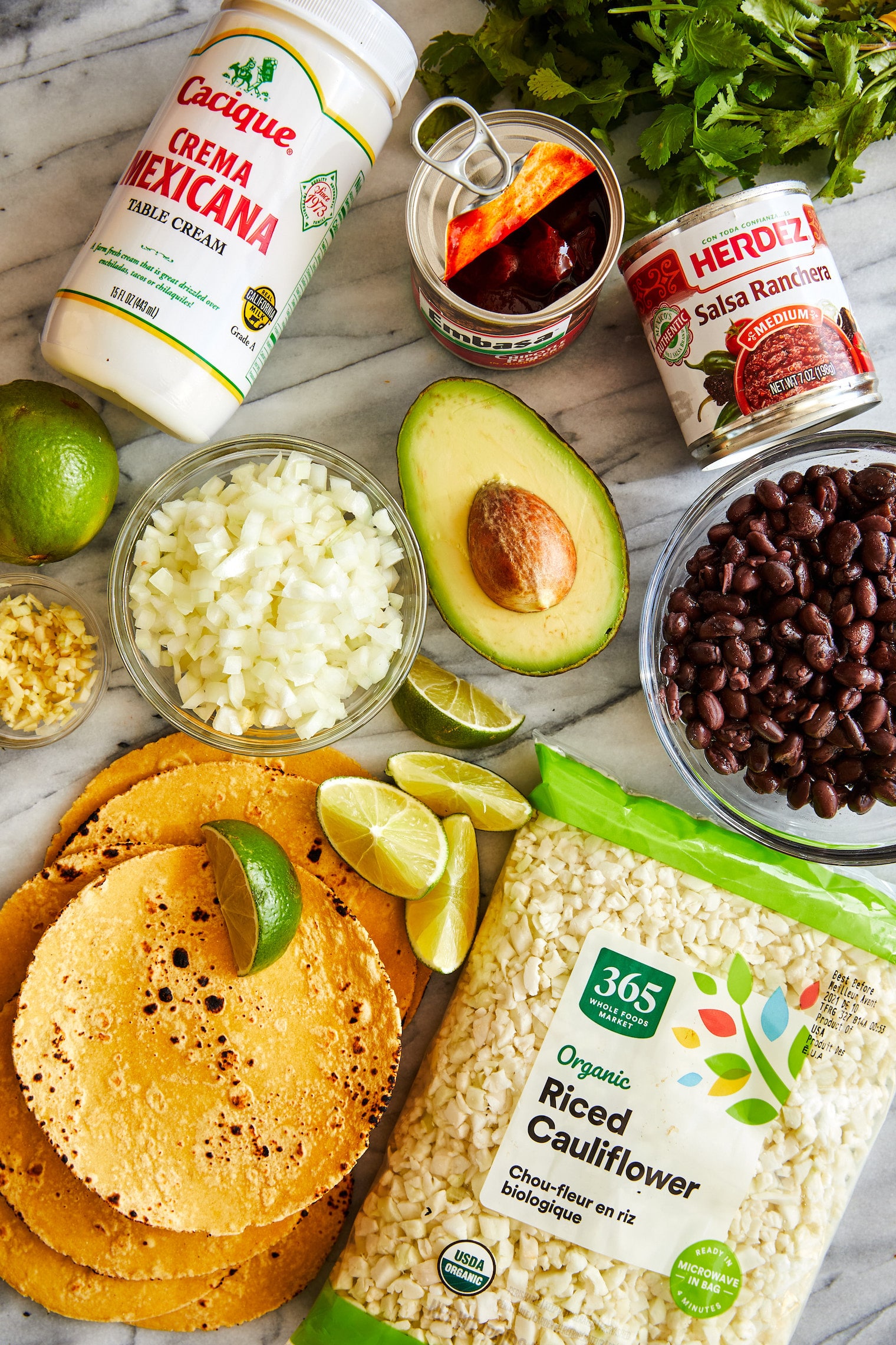 Cauliflower Tacos - SO PERFECT FOR TACO NIGHT! Completely vegetarian and so easy to make, topped with the best avocado crema sauce. SO GOOD.