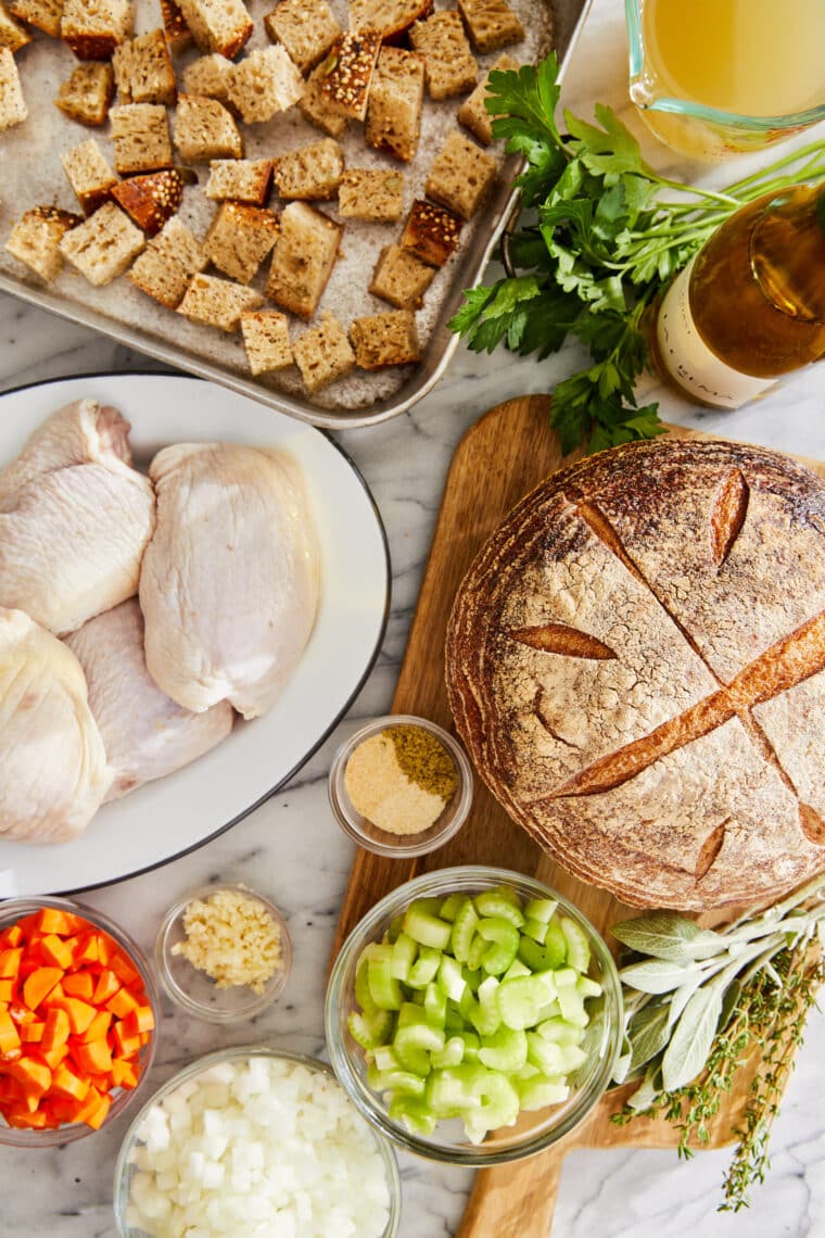 Sheet Pan Chicken and Stuffing - The best no-fuss SHEET PAN DINNER! Crisp, juicy chicken thighs baked alongside my favorite stuffing recipe.