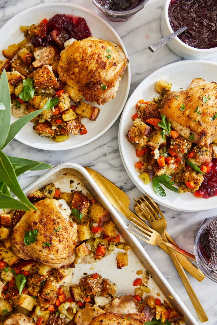 Sheet Pan Chicken and Stuffing - The best no-fuss SHEET PAN DINNER! Crisp, juicy chicken thighs baked alongside my favorite stuffing recipe.