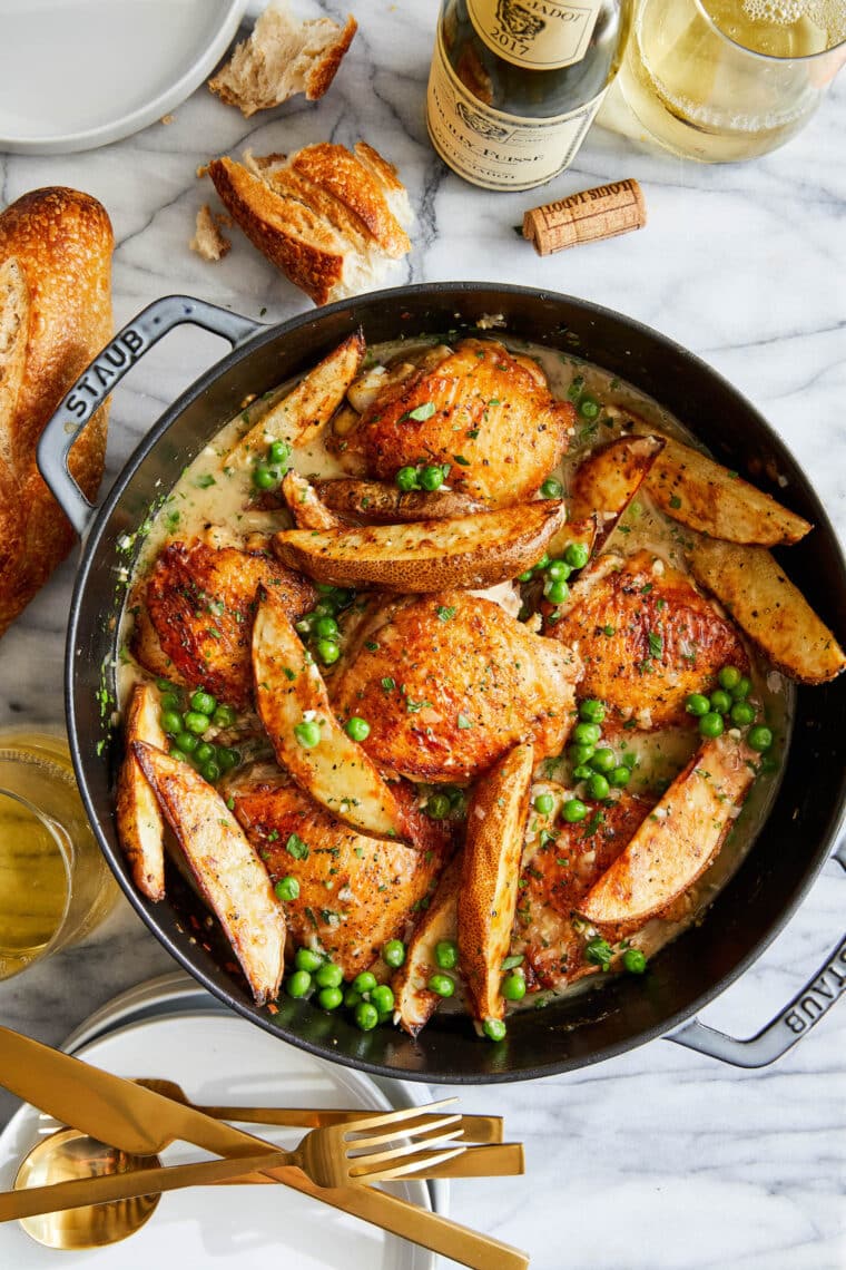 Chicken Vesuvio - Perfectly juicy chicken, peas and potatoes in THE BEST white wine sauce.  Truly the best fried chicken dish ever.