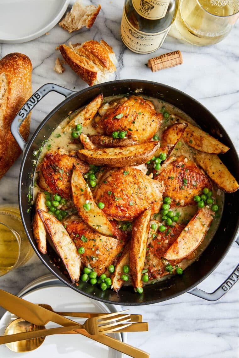 Vesuvius Chicken - perfectly juicy chicken, peas and potatoes in the best white wine sauce.  Truly the best roast chicken ever.