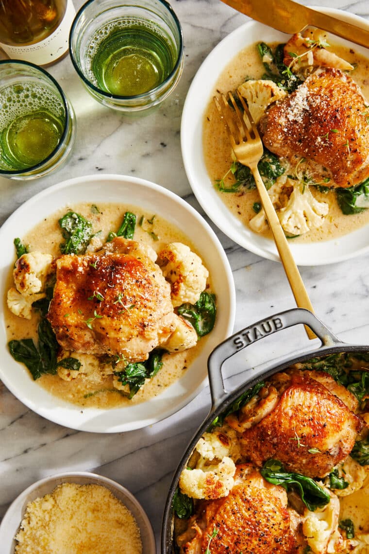 Chicken and creamy cauliflower - soft and juicy golden brown chicken cooked in a heavenly cream sauce with roasted cauliflower + baby spinach!