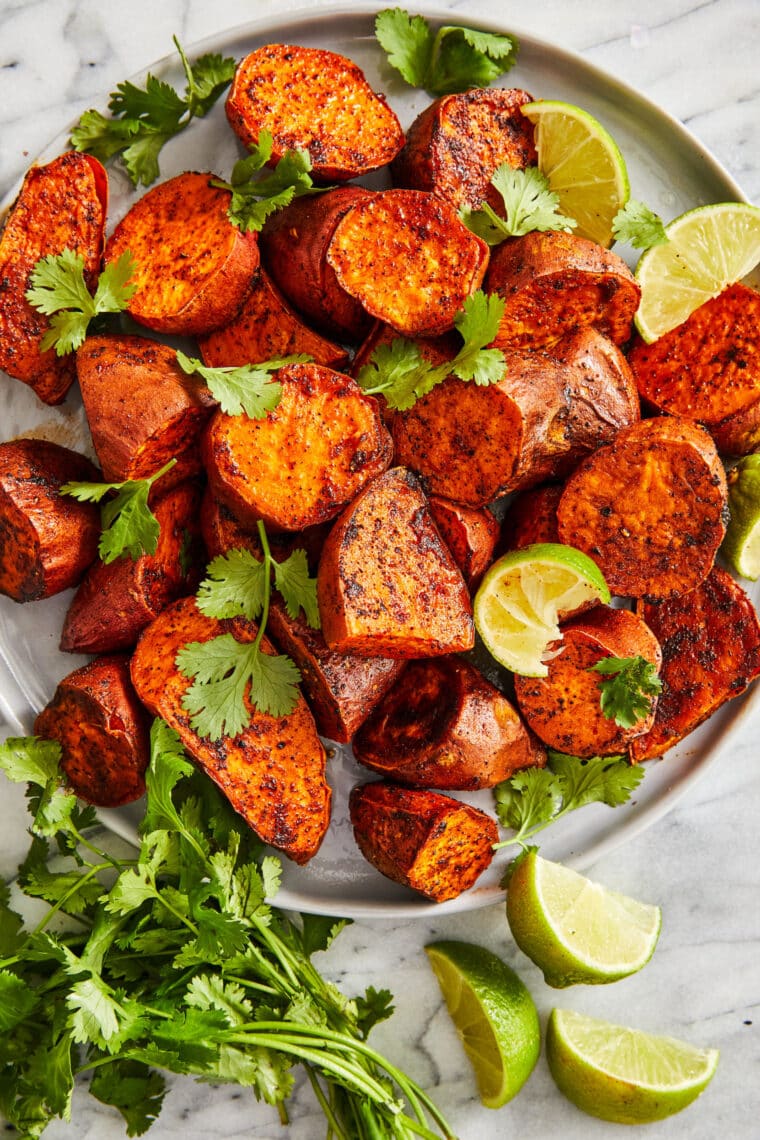 Roasted Sweet Potatoes - Amazingly crisp-tender sweet potatoes roasted to perfection. Such a quick, easy, vegetarian side dish for any meal!