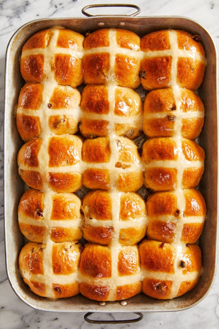 Hot Cross Buns - Homemade hot cross buns that are so soft, fluffy + slightly sweet. An absolute must for Easter - they'll disappear so fast!