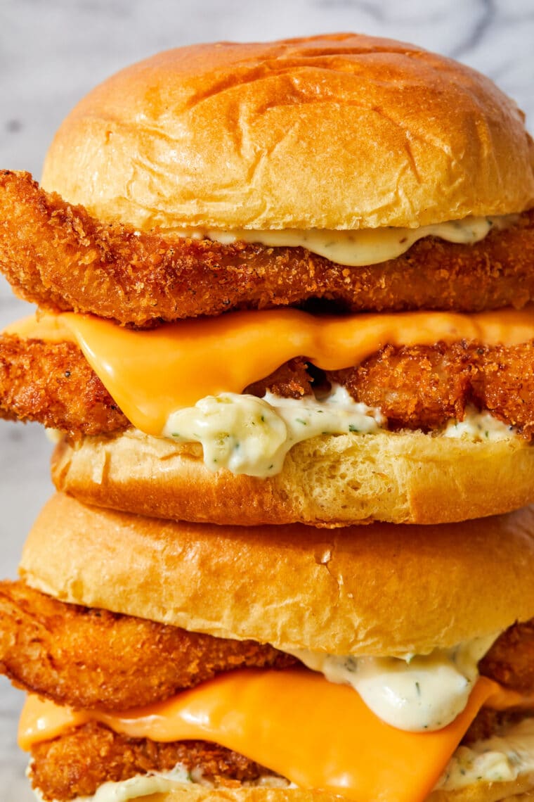 Crispy Fish Sandwiches - Oh-so-crisp fish sandwiches with melted cheese, soft brioche buns and homemade tartar sauce! Seriously so so good.