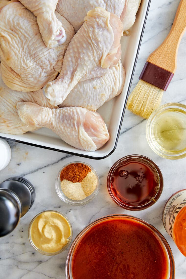 Grilled BBQ Chicken - Tender, juicy chicken grilled to perfection with a sweet and sticky barbecue glaze! Includes the easiest marinade ever.