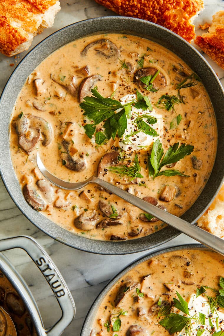 Hungarian Mushroom Soup - The creamiest mushroom soup with fresh dill, thyme, and paprika. Top with a dollop of sour cream and crusty bread!