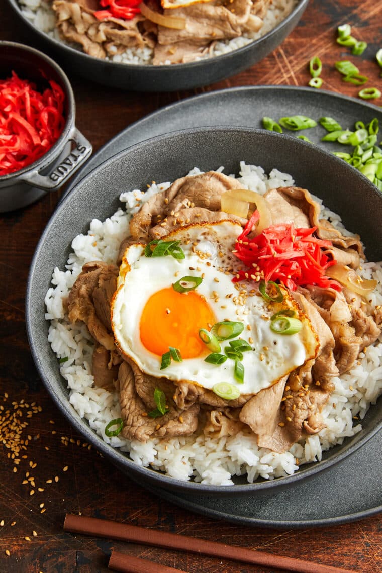 Gyudon (Japanese Beef Rice Bowl) - A weeknight favorite with thinly sliced beef + tender onions in a sweet and savory sauce! So quick + easy!