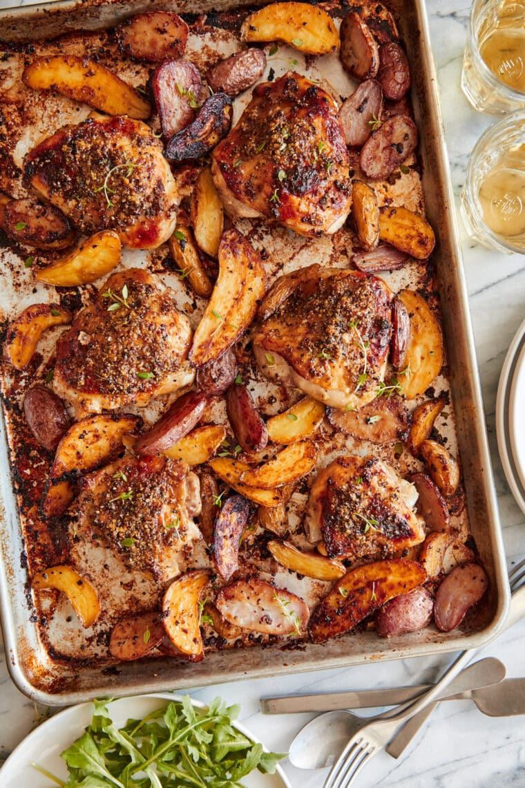 Sheet Pan Honey Mustard Chicken and Potatoes - ONE POT EASY DINNER! Tender, oh-so-juicy oven baked chicken in THE BEST honey mustard sauce.