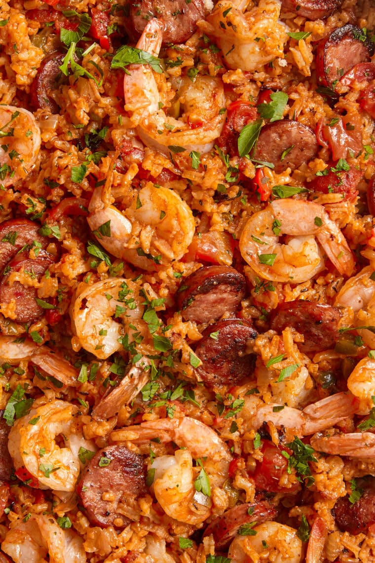 Easy Jambalaya - With sausage, shrimp, veggies, rice + all the best signature flavors, all made in ONE POT! So good with the easiest clean up!