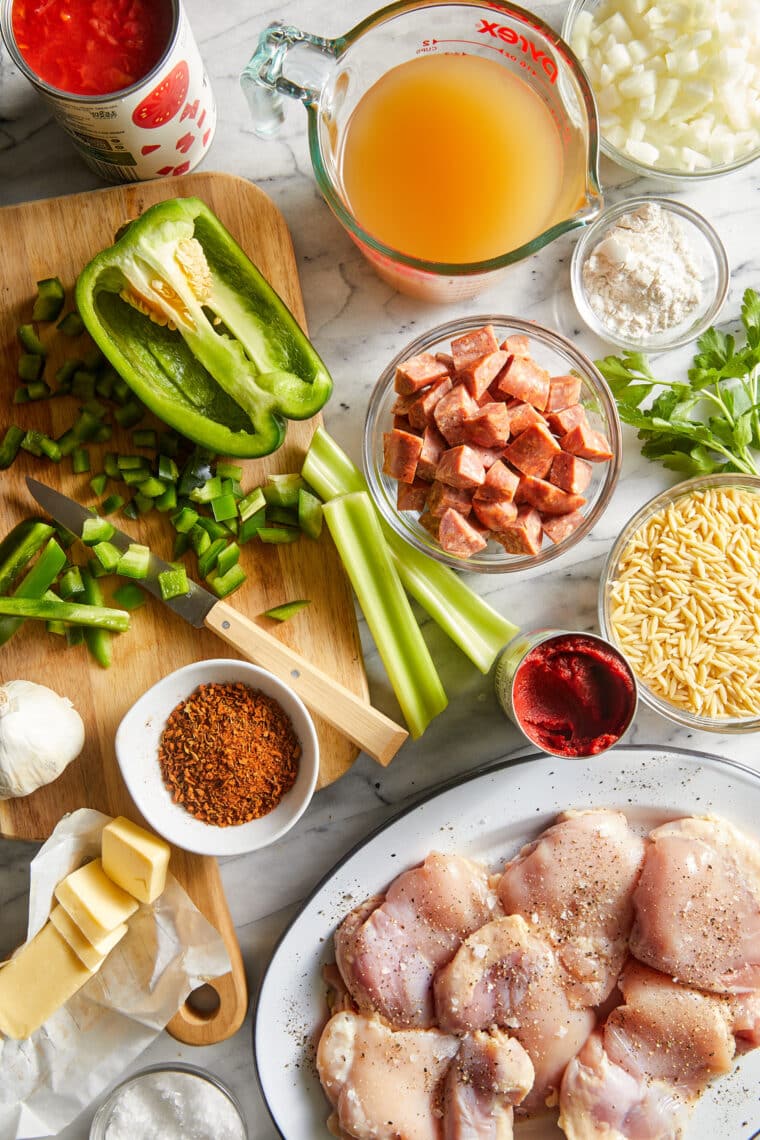 One Pot Cajun Chicken and Orzo - With creamy orzo, chicken, cajun seasoning, and andouille sausage. SUPER EASY + can be made in only ONE POT!