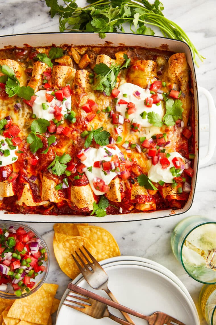 Red and Green Chicken Enchiladas - Can't decide between red or green enchilada sauce? Now you can have both and have the best of both worlds!