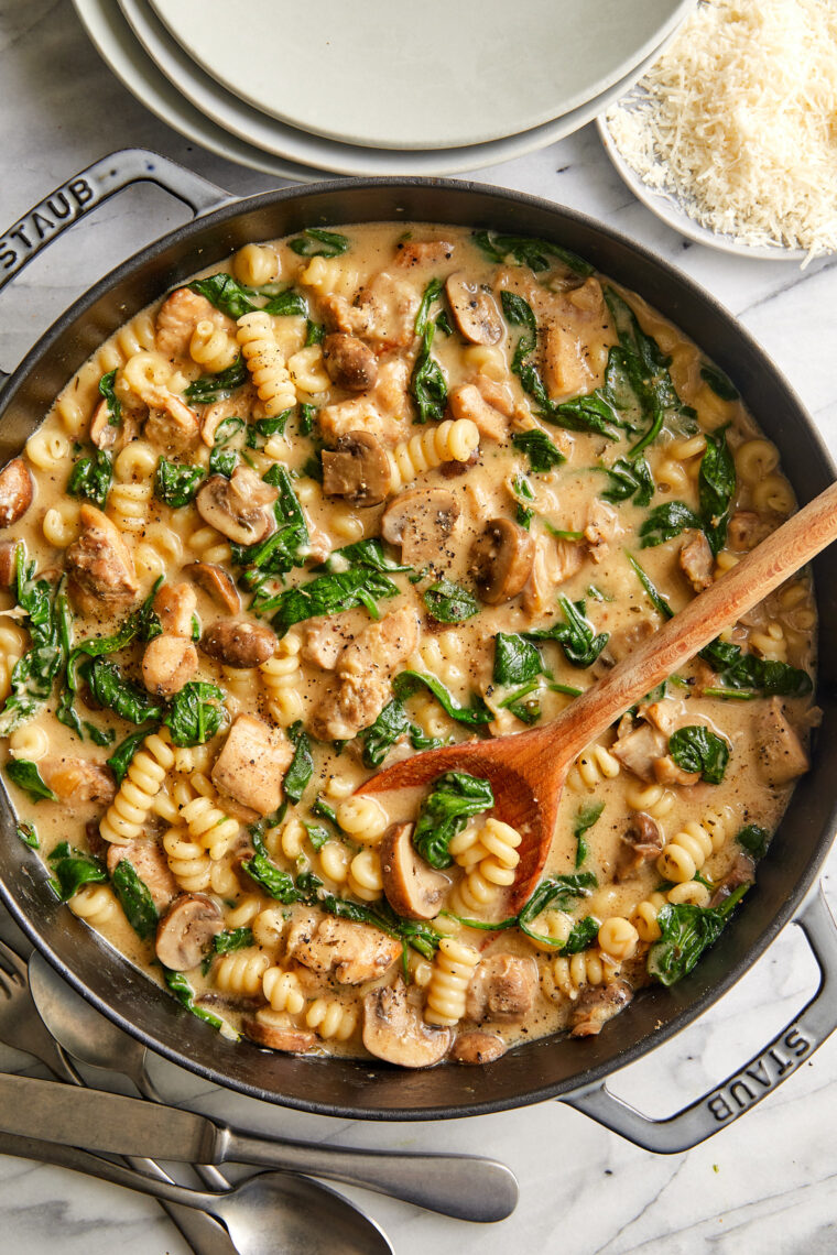 One Pot Creamy Chicken and Mushroom Pasta - No fuss ONE POT MEAL! So so creamy, so easy. Chockfull of tender chicken, mushrooms, and spinach!