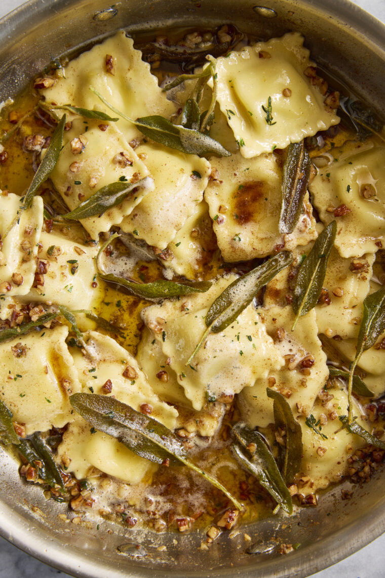 Ravioli with Sage Butter Sauce - The quickest (BEST!) 25 min dinner. With a nutty garlicky brown butter sauce, crispy sage & toasted pecans!