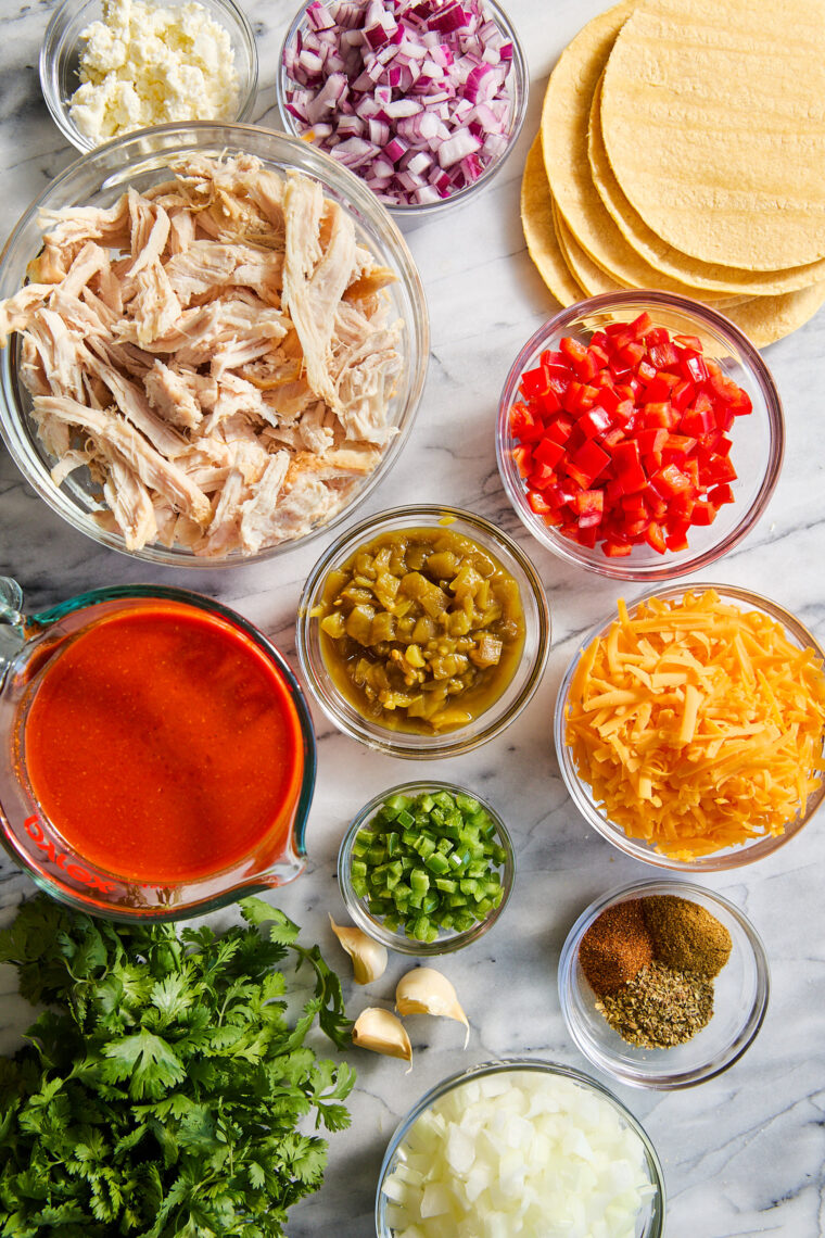 Leftover Thanksgiving Turkey Enchiladas - Best way to use up your leftover holiday turkey (or chicken!). A crowd-pleaser for kids + grown ups!