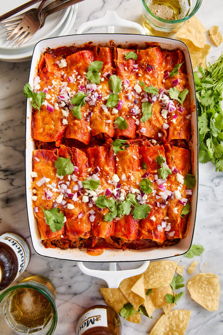 Leftover Thanksgiving Turkey Enchiladas - Best way to use up your leftover holiday turkey (or chicken!). A crowd-pleaser for kids + grown ups!