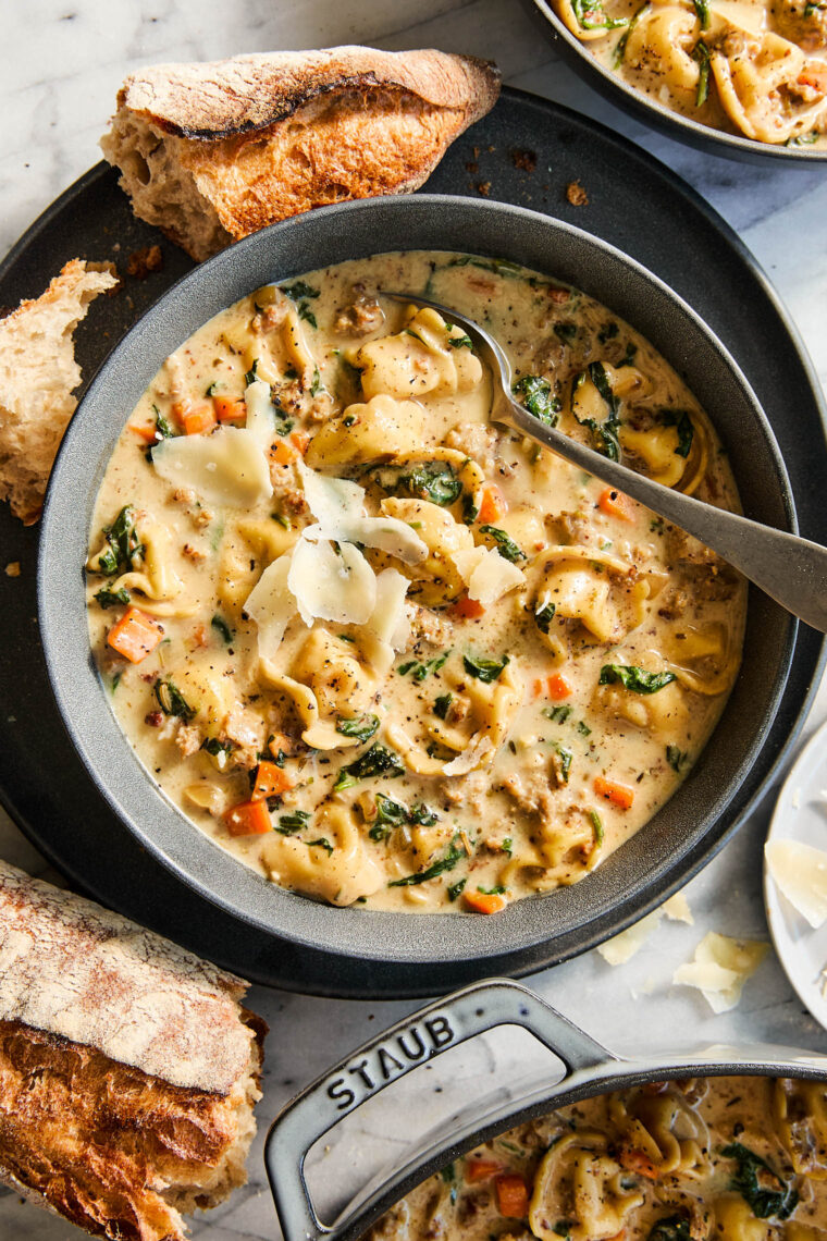 Sausage Tortellini Soup - Quick, easy weeknight meal made in 40 min! With crumbled sausage, tortellini, spinach, cream and basil. So creamy!