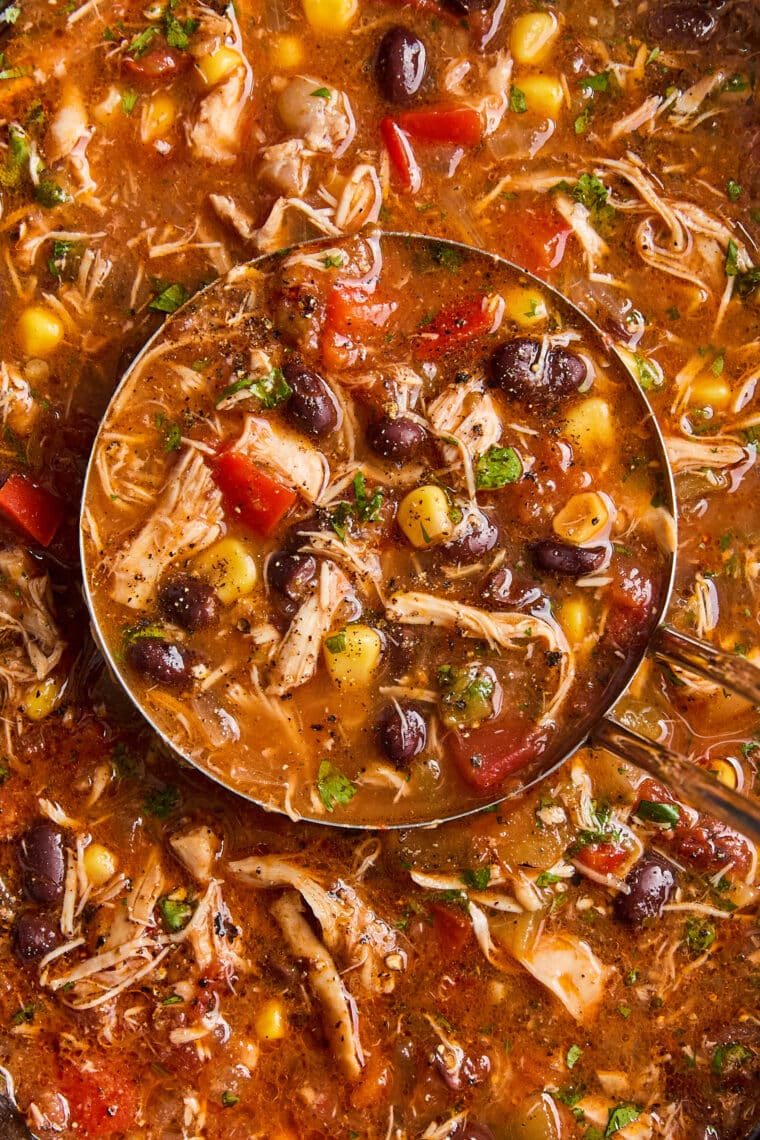 Slow Cooker Chicken Tortilla Soup - Restaurant-quality with so much flavor! No sautéing, no babysitting here with 5 min prep. Set and forget!